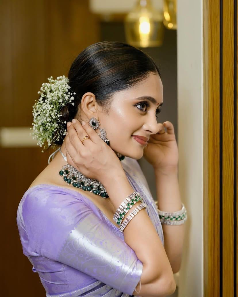 Grace in Lavender: Elegant Saree with Floral Hair Adornment