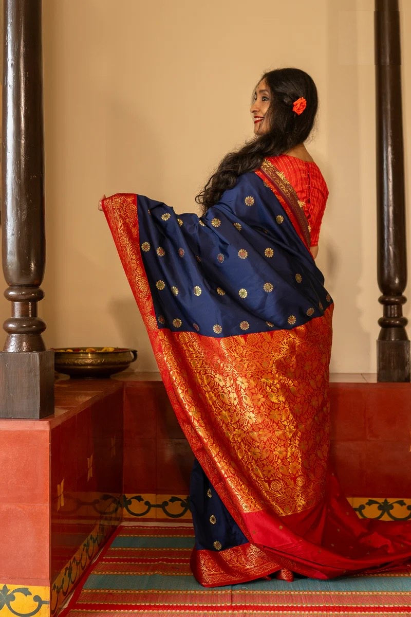 Traditional Kanjivaram Silk Saree with Rich Zari Border and Floral Motifs
