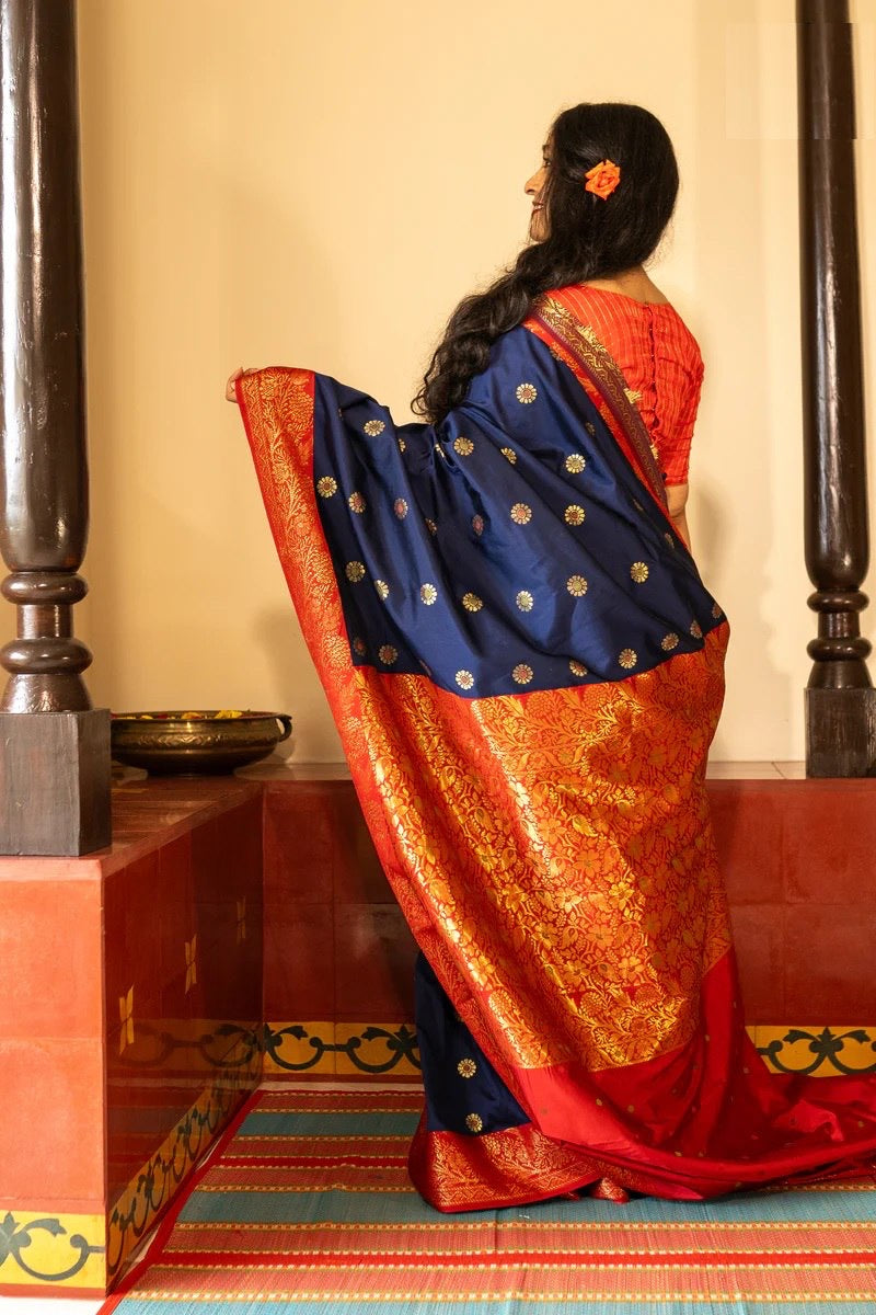 Traditional Kanjivaram Silk Saree with Rich Zari Border and Floral Motifs