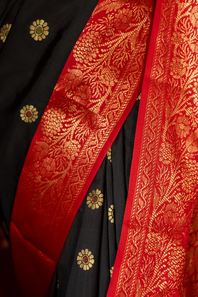 Traditional Kanjivaram Silk Saree with Rich Zari Border and Floral Motifs