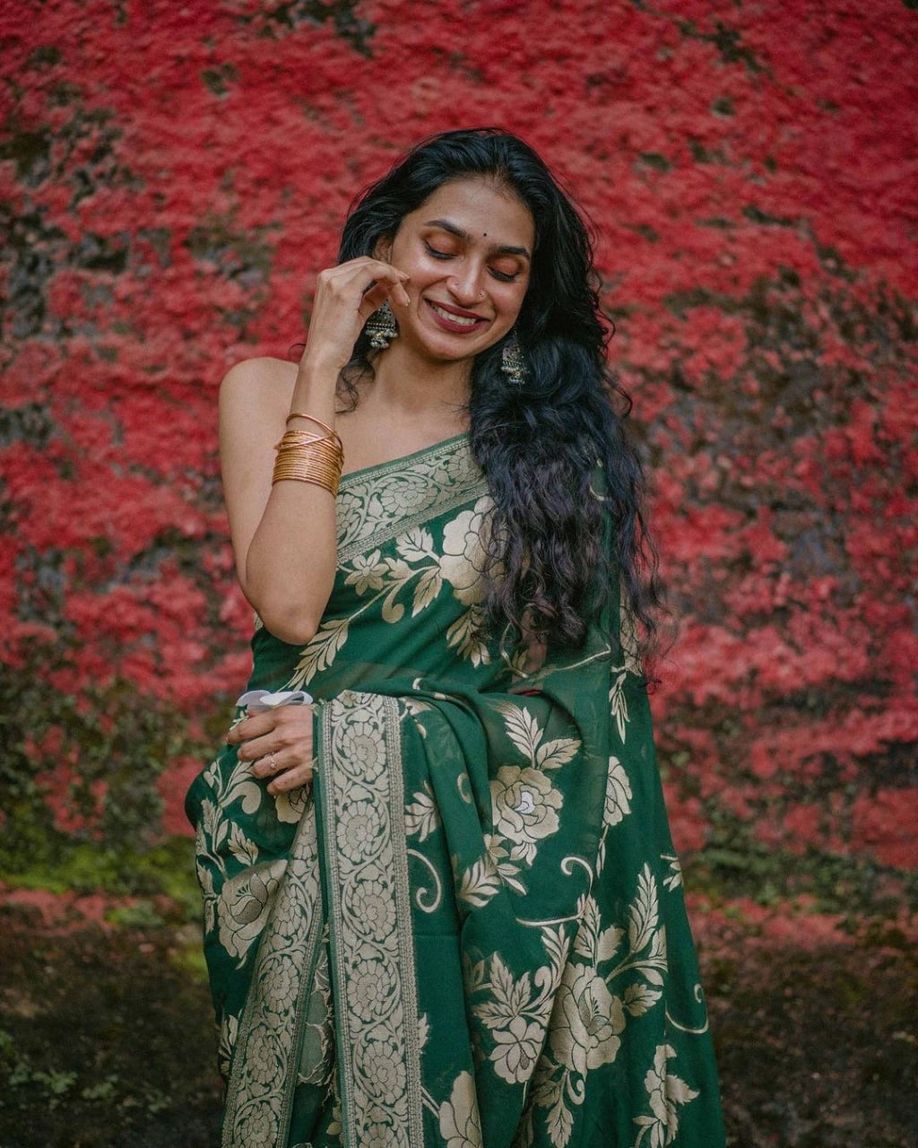 Elegant Bottle Green Floral Woven Saree with Antique Gold Detailing