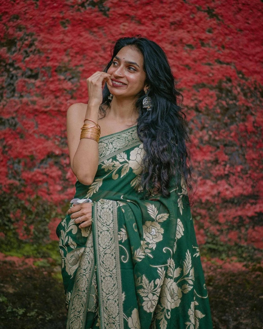 Elegant Bottle Green Floral Woven Saree with Antique Gold Detailing