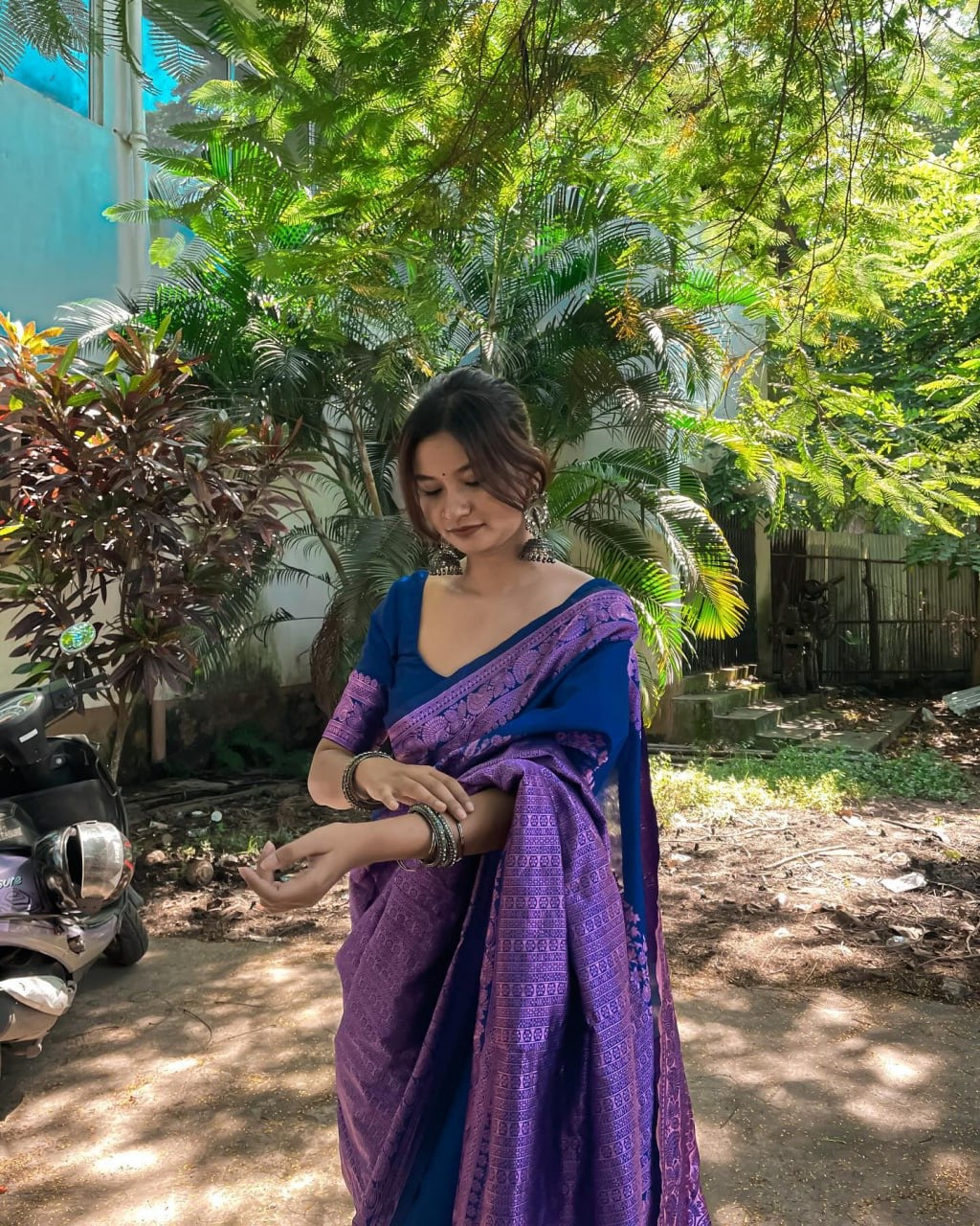 Royal Blue and Purple Banarasi Silk Saree with Intricate Zari Border.