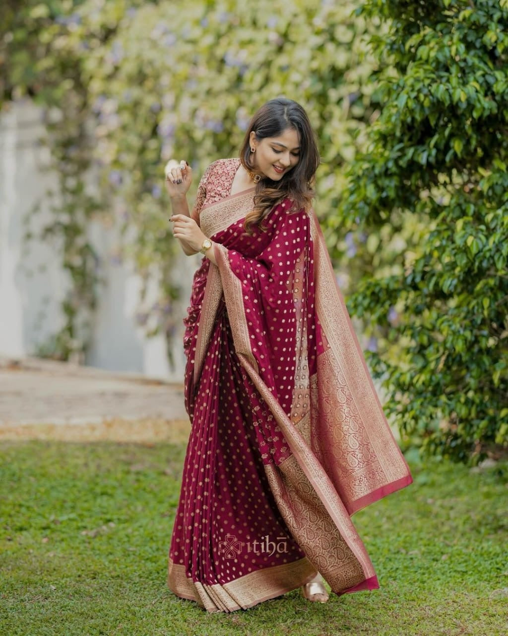 Elegant Maroon Banarasi Silk Saree with Gold Zari Border and Small Floral Motifs