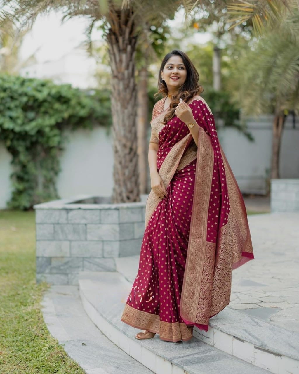 Elegant Maroon Banarasi Silk Saree with Gold Zari Border and Small Floral Motifs