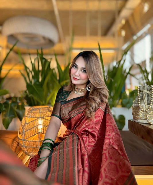 Majestic Maroon Banarasi Silk Saree with Intricate Zari Weave and Green Border