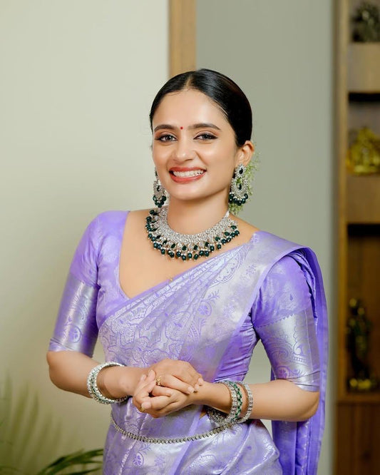 Grace in Lavender: Elegant Saree with Floral Hair Adornment