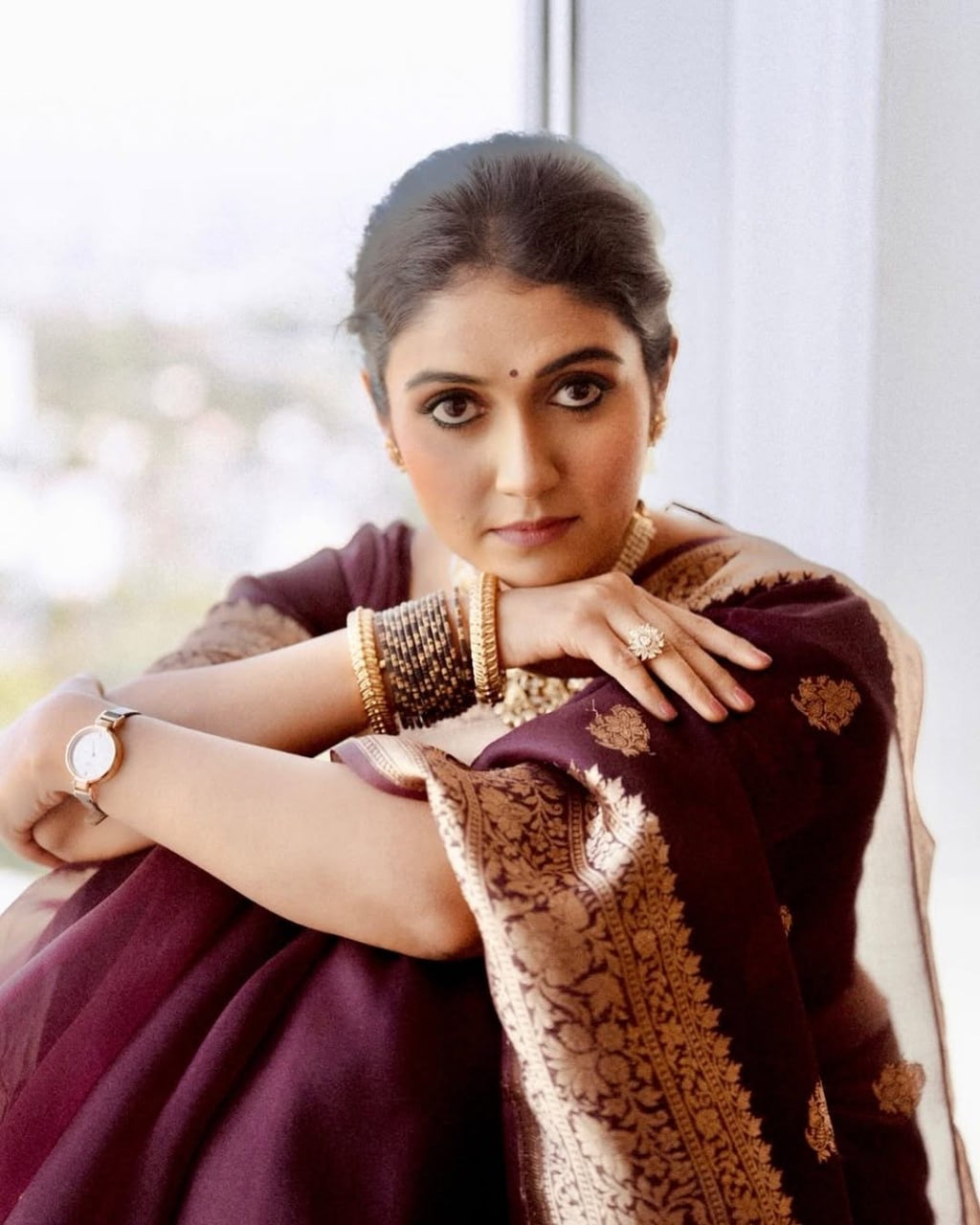 Wine Maroon Banarasi Silk Saree with Antique Golden Zari Work