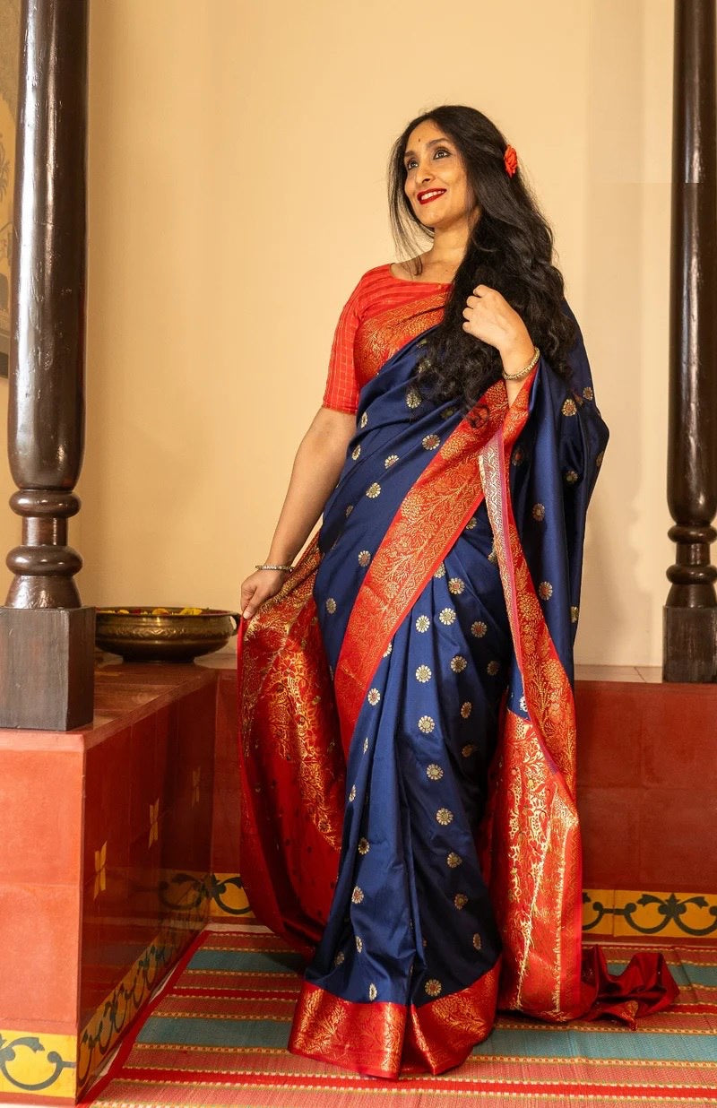 Traditional Kanjivaram Silk Saree with Rich Zari Border and Floral Motifs