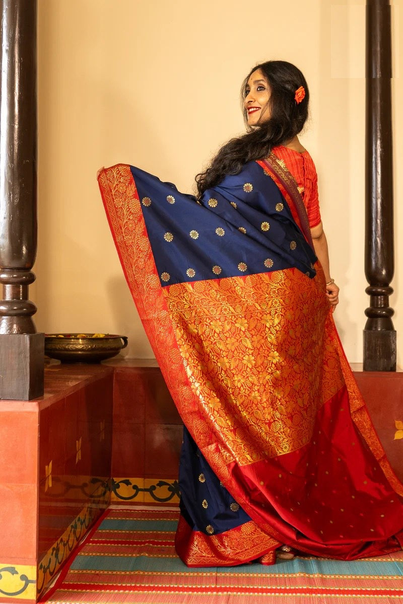 Traditional Kanjivaram Silk Saree with Rich Zari Border and Floral Motifs