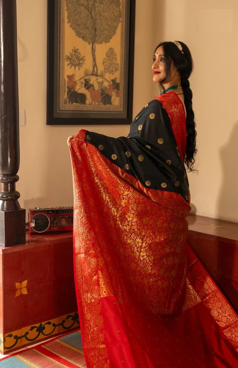 Traditional Kanjivaram Silk Saree with Rich Zari Border and Floral Motifs