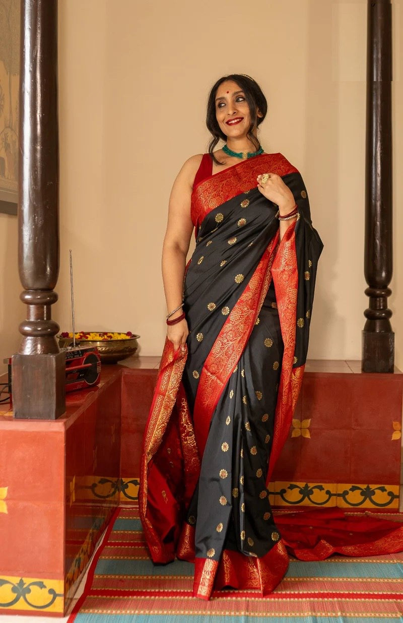Traditional Kanjivaram Silk Saree with Rich Zari Border and Floral Motifs