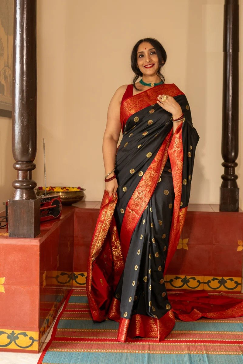 Traditional Kanjivaram Silk Saree with Rich Zari Border and Floral Motifs
