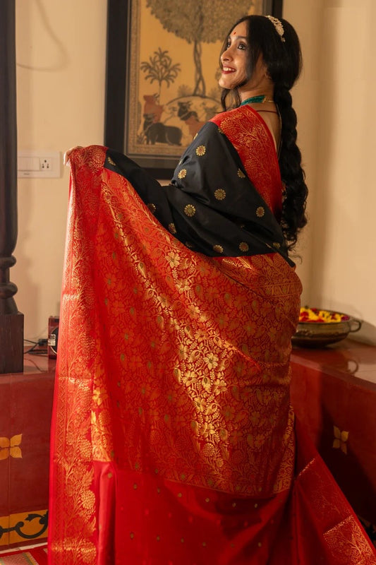 Traditional Kanjivaram Silk Saree with Rich Zari Border and Floral Motifs