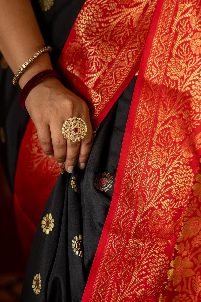 Traditional Kanjivaram Silk Saree with Rich Zari Border and Floral Motifs